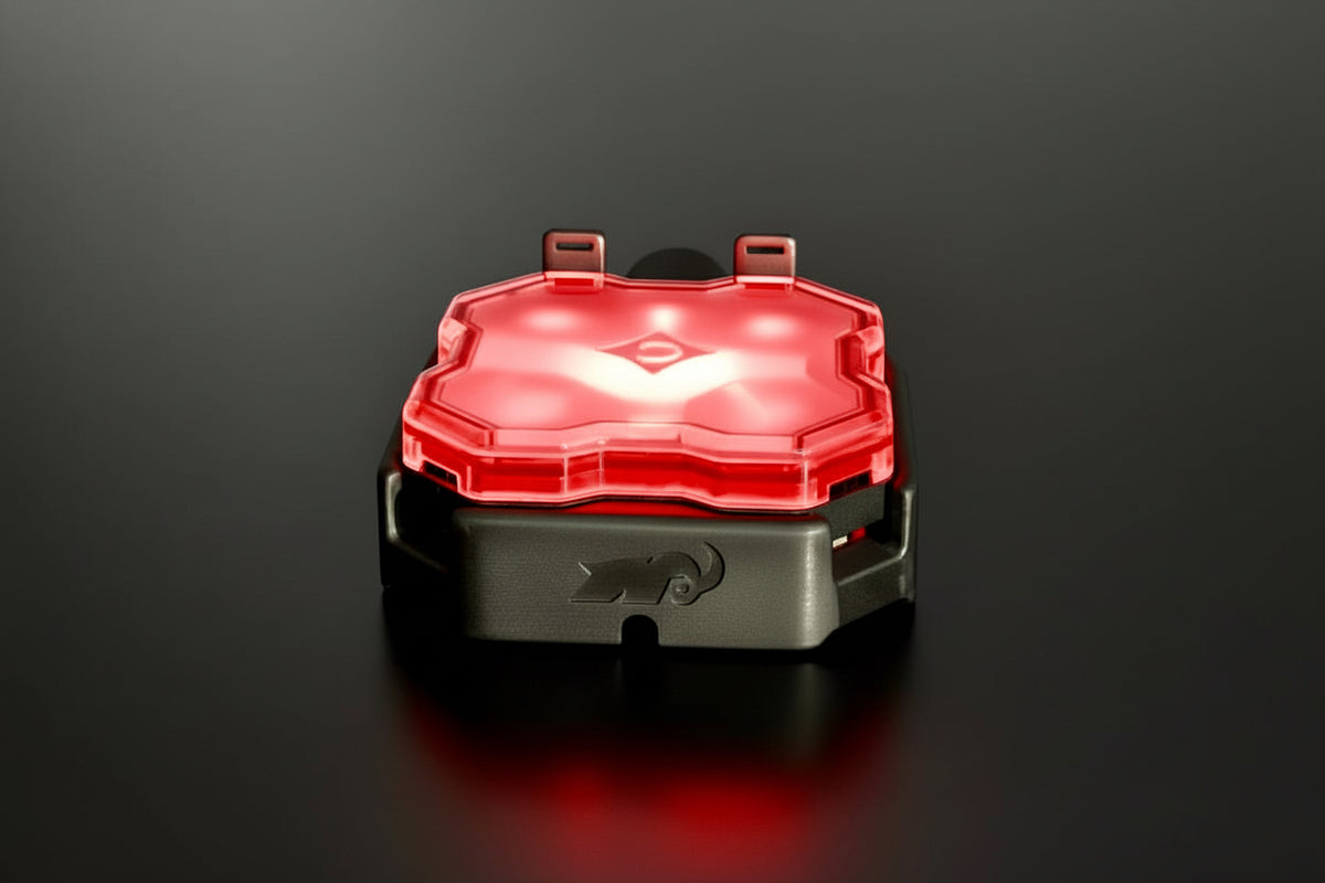 Red light-emitting device on a dark textured surface