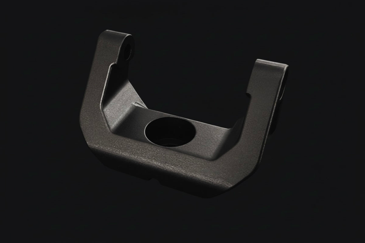Metal U-shaped bracket on a black background