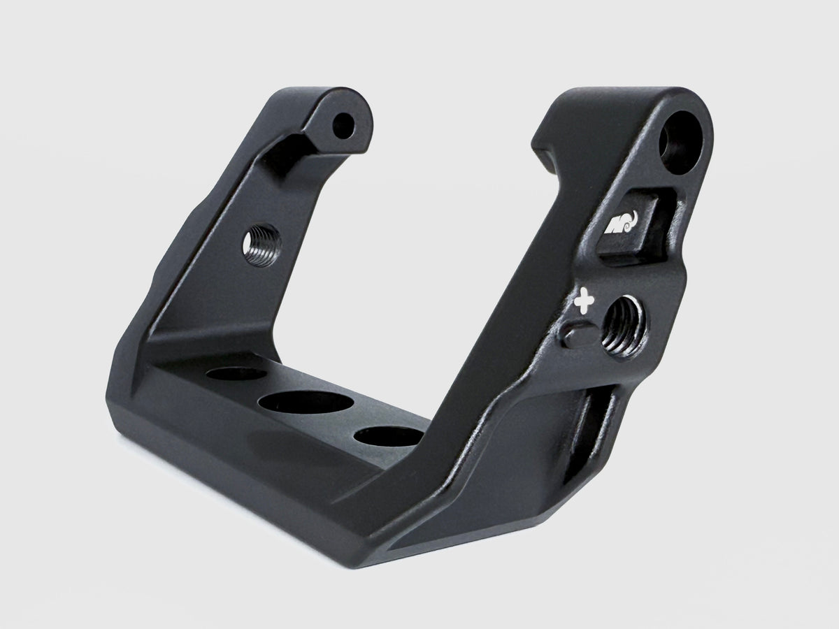 Black metal bracket on a light gray background