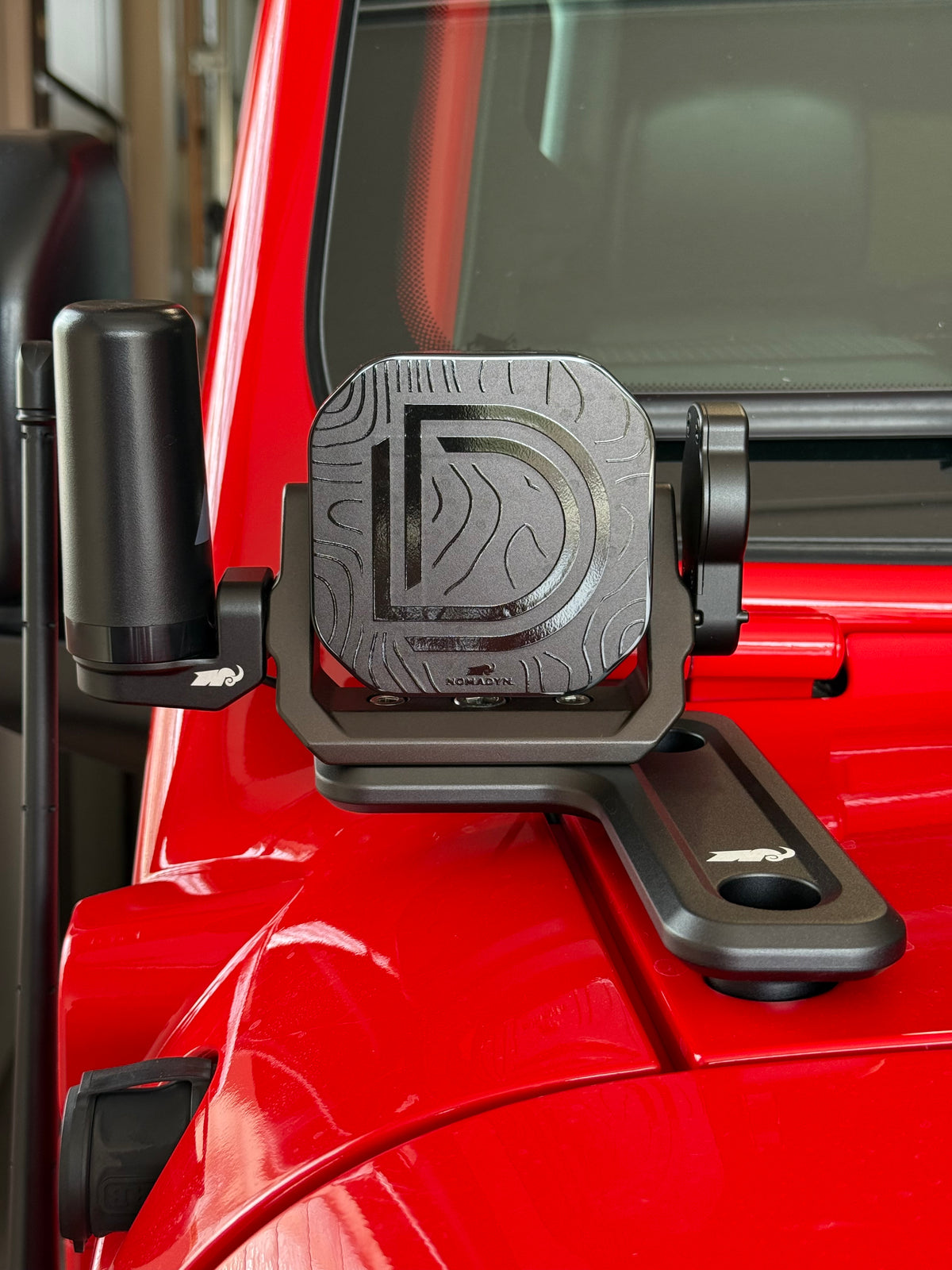 black light mount on red vehicle